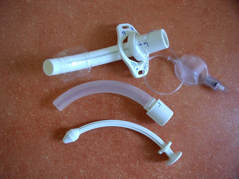 Tracheostomy/An outer cannula (top item) with inflatable cuff (top right), an inner cannula (center item) and an obturator (b